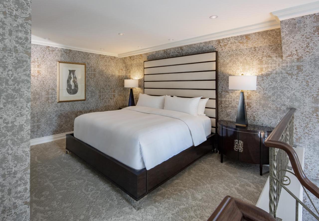 Chateau Vaudreuil Esterno foto A bedroom at the Four Seasons Hotel