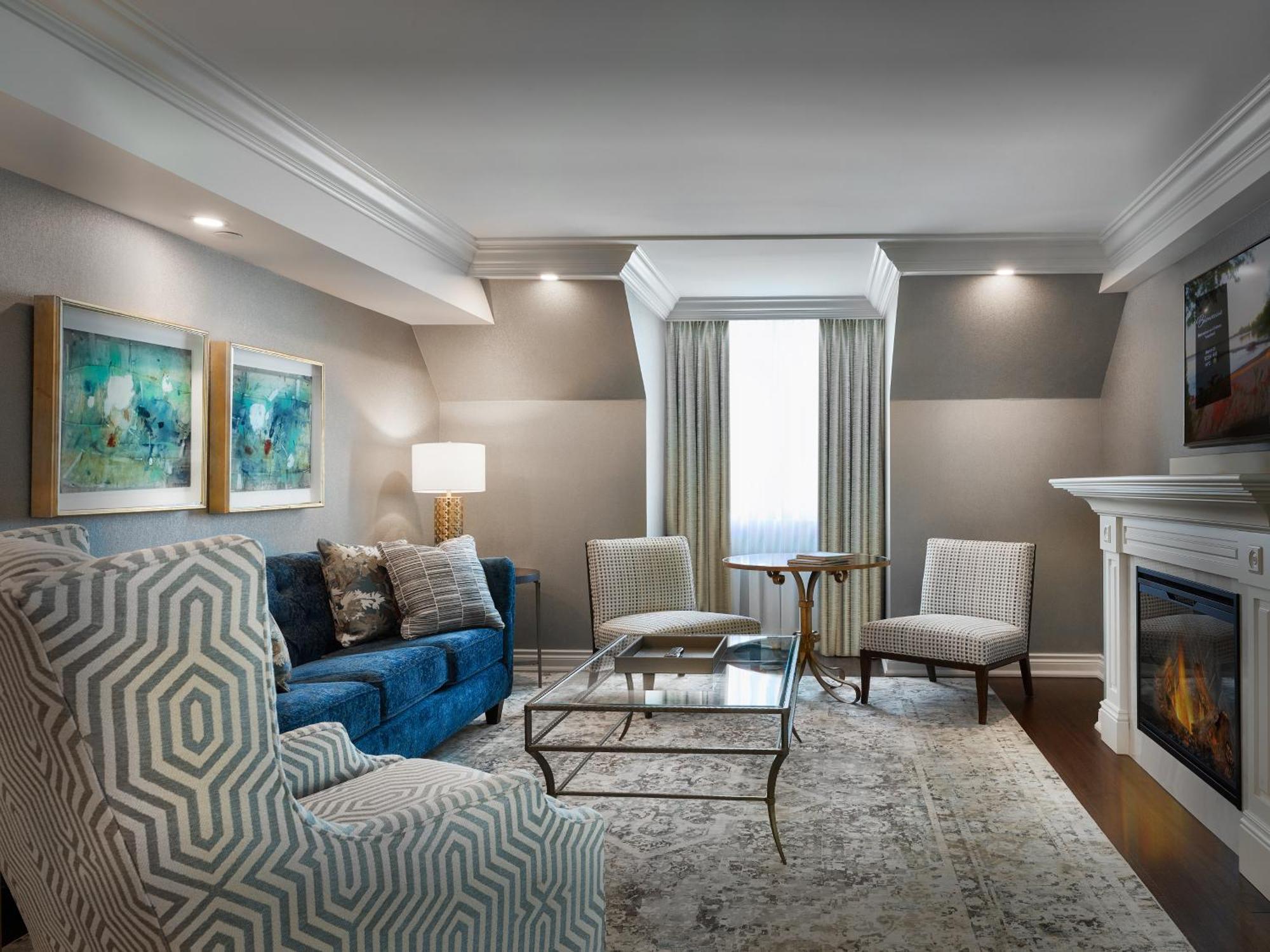 Chateau Vaudreuil Esterno foto A living room at the hotel